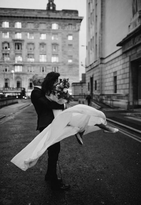 picture of a couple in the city after their wedding
